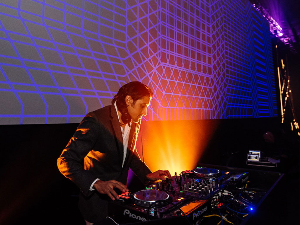 DJ SR on the decks at a London awards gala