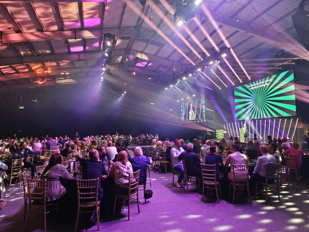 SRS awards night 2025 at Telford International Centre: round tables, stage lighting and screens